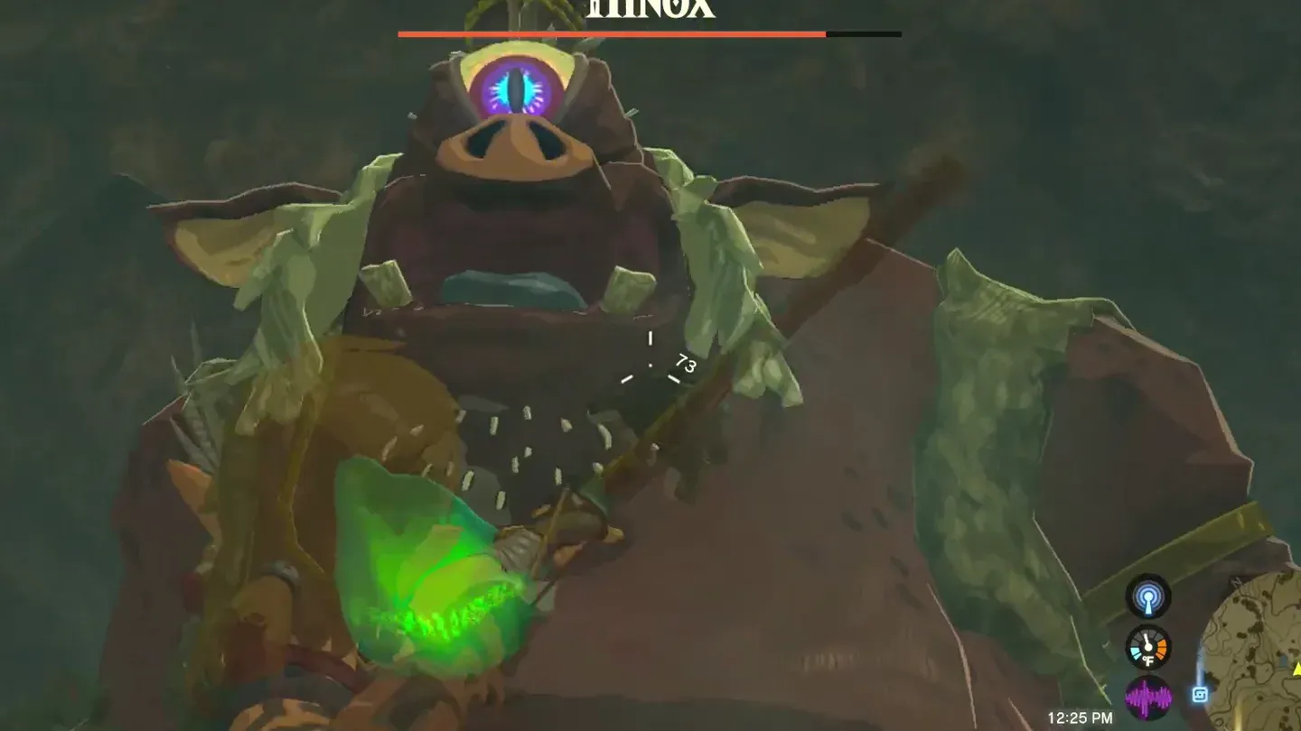 The Hinox looming over Link with the key around its neck