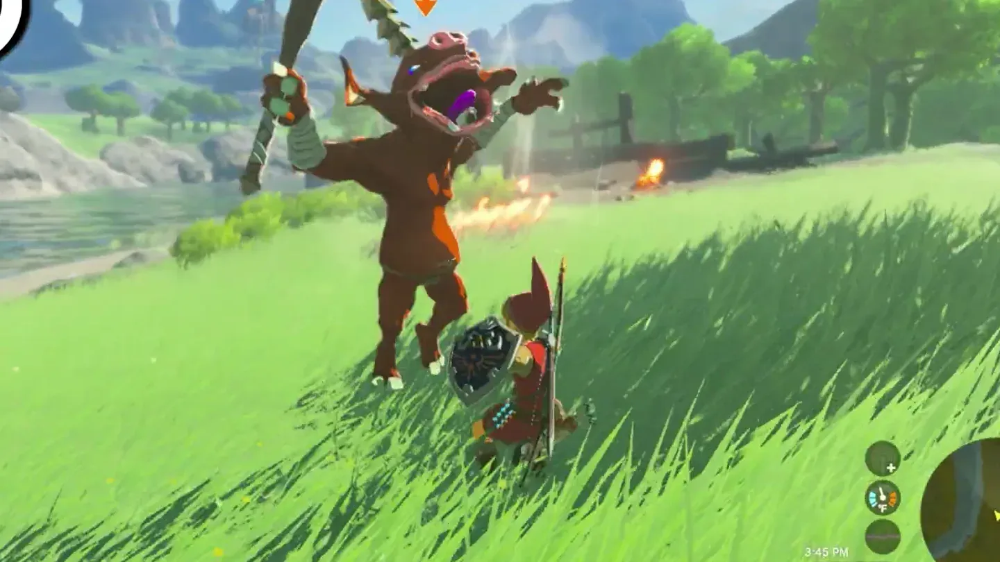 A red Bokoblin lifting its weapon over Link in a grassy field