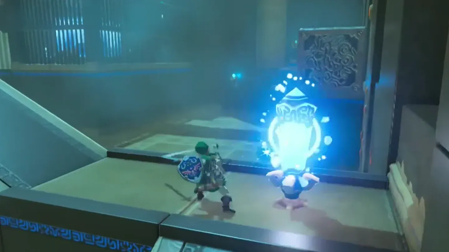 Link striking the glowing crystal at the top of the ramp