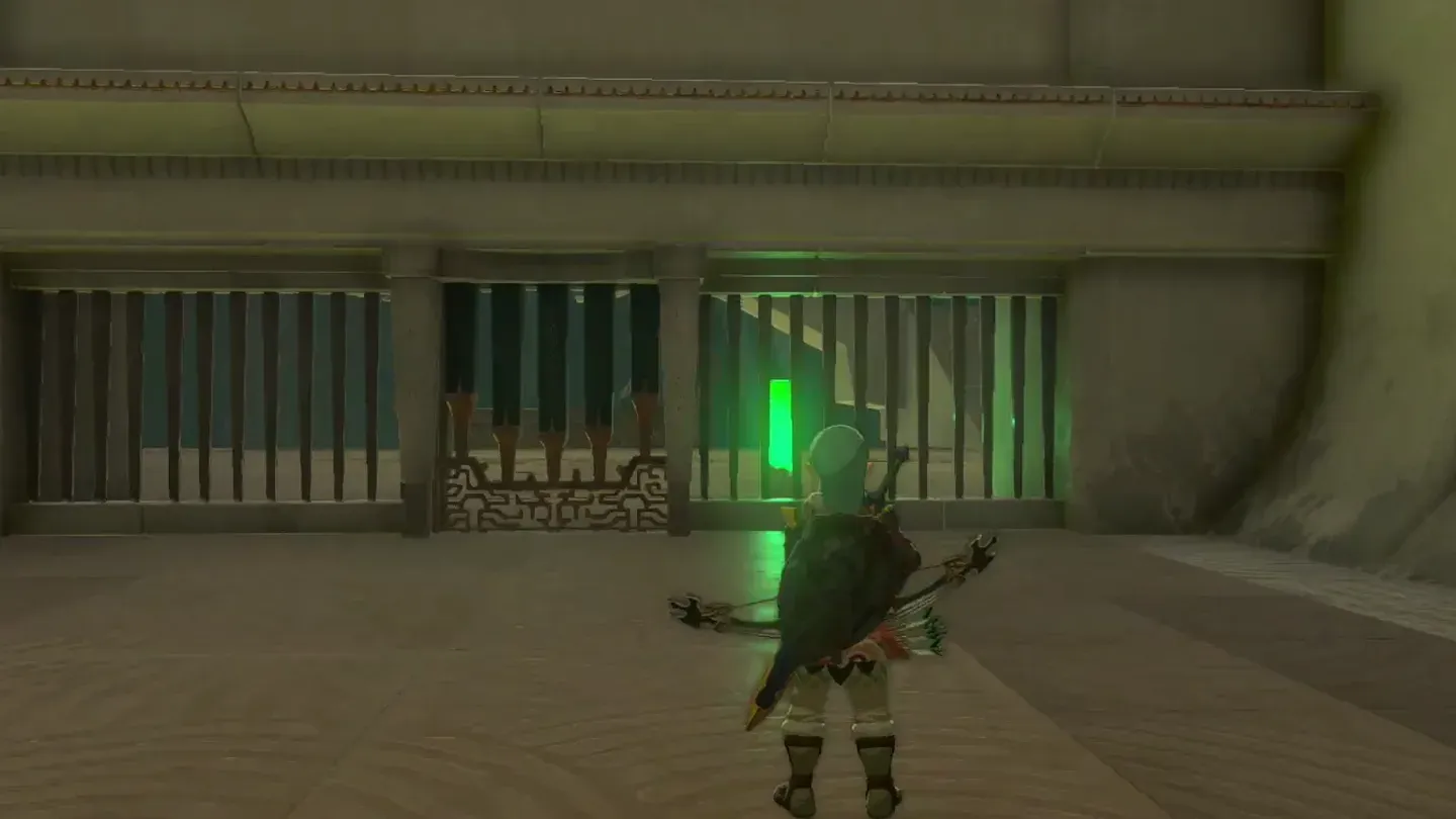 The first gate with a glowing switch behind its bars