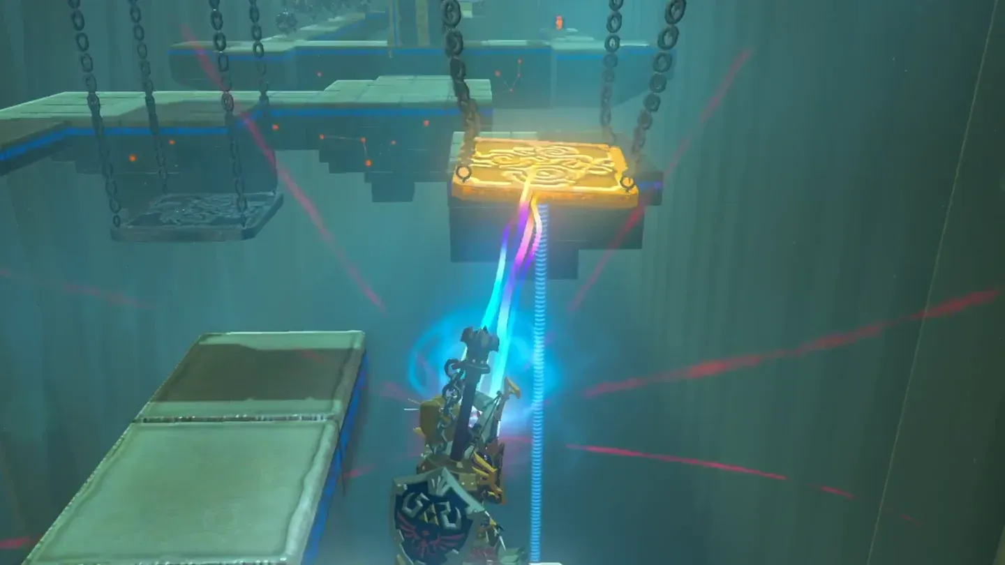 Link pulling a hanging metal platform toward him with Magnesis