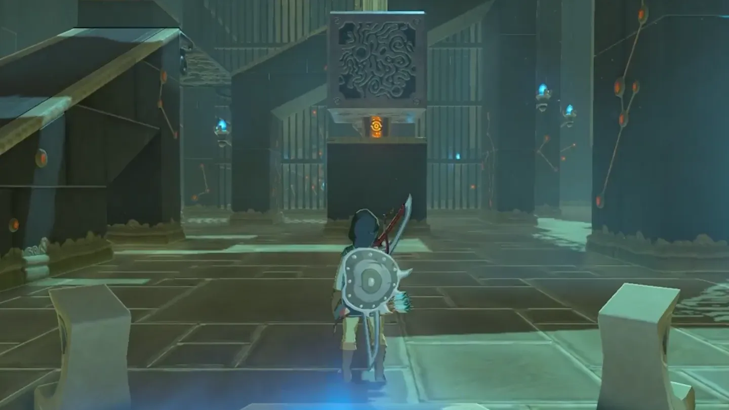 The metal cube on the central rail above a treasure chest