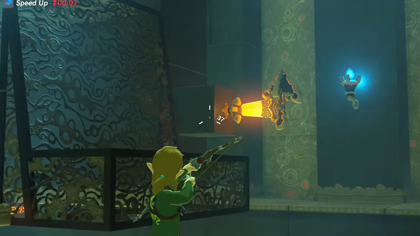 Link aiming his bow at the orange crystal on the right wall