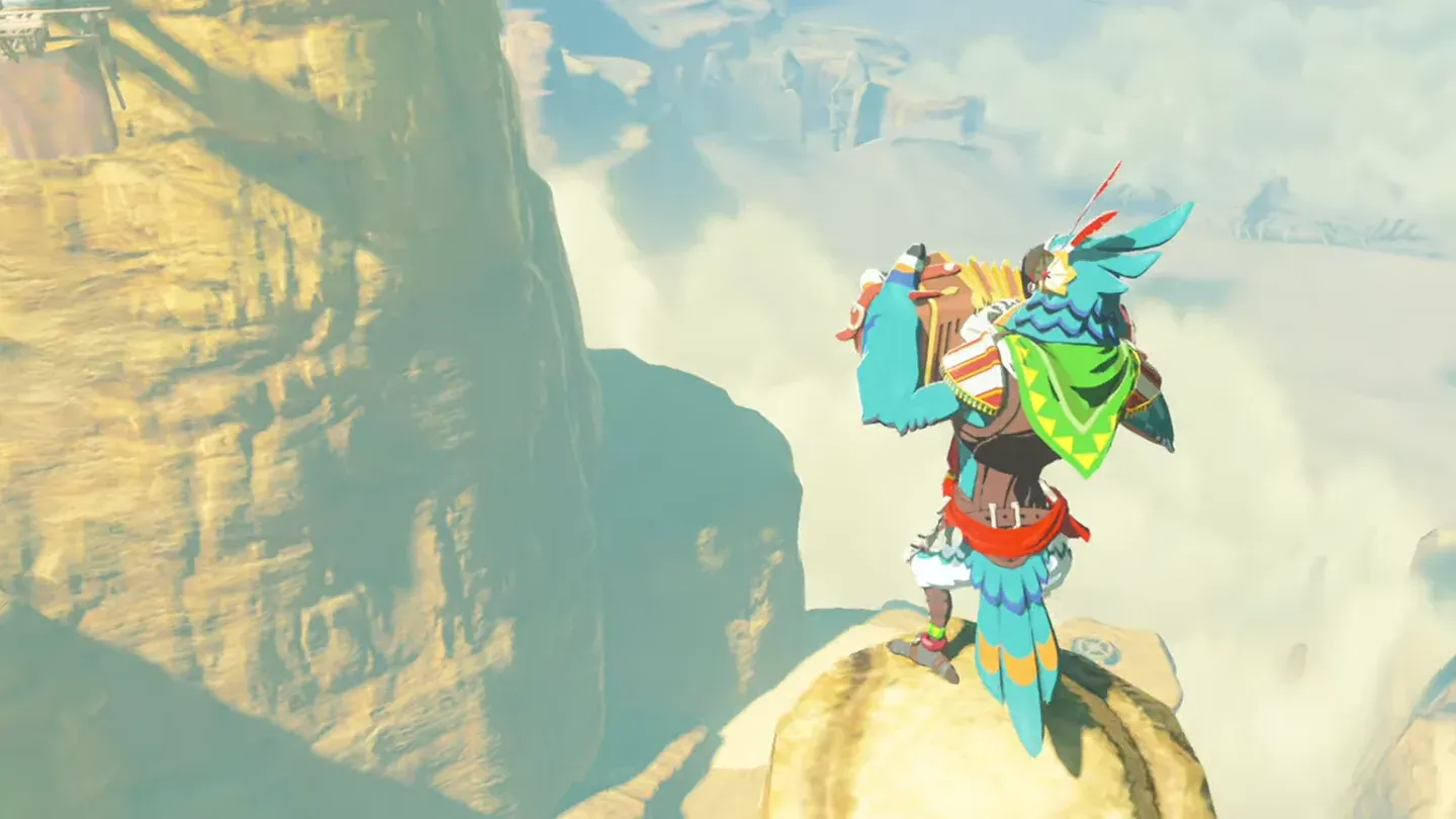 Kass playing his accordion on a rock atop Gerudo Tower