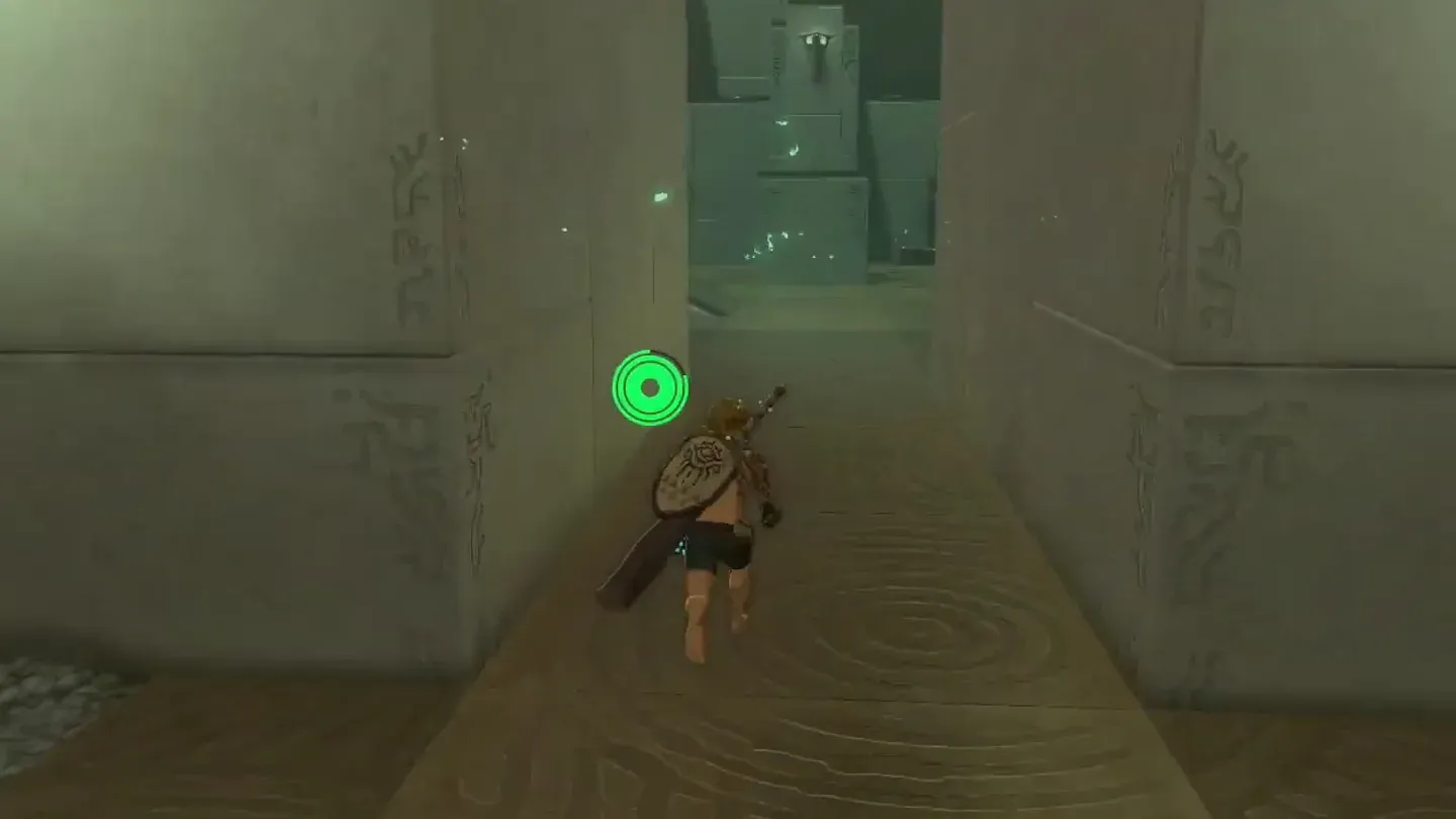 Link walking into the Proving Grounds with the entrance gear behind