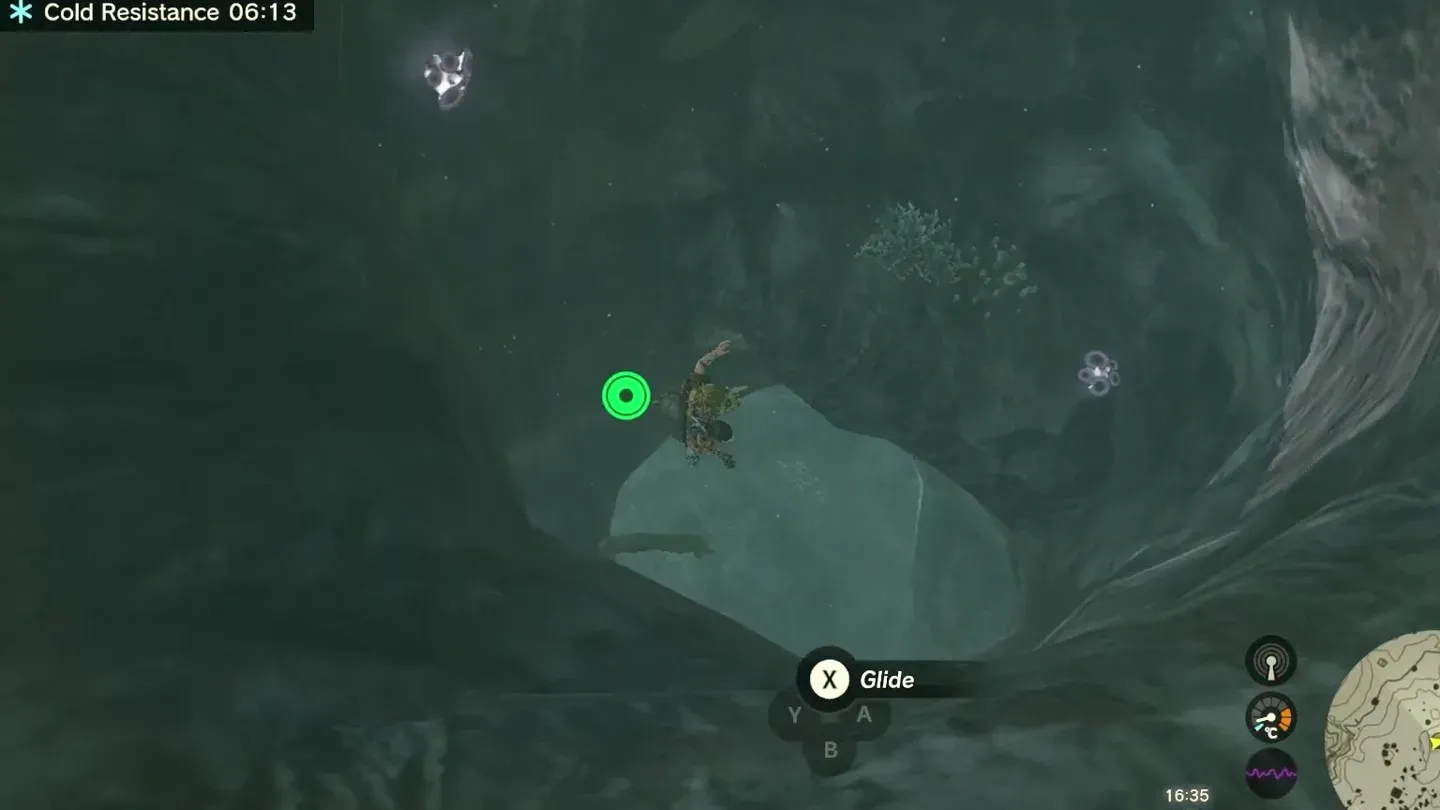 Link gliding down through the hole into the cave