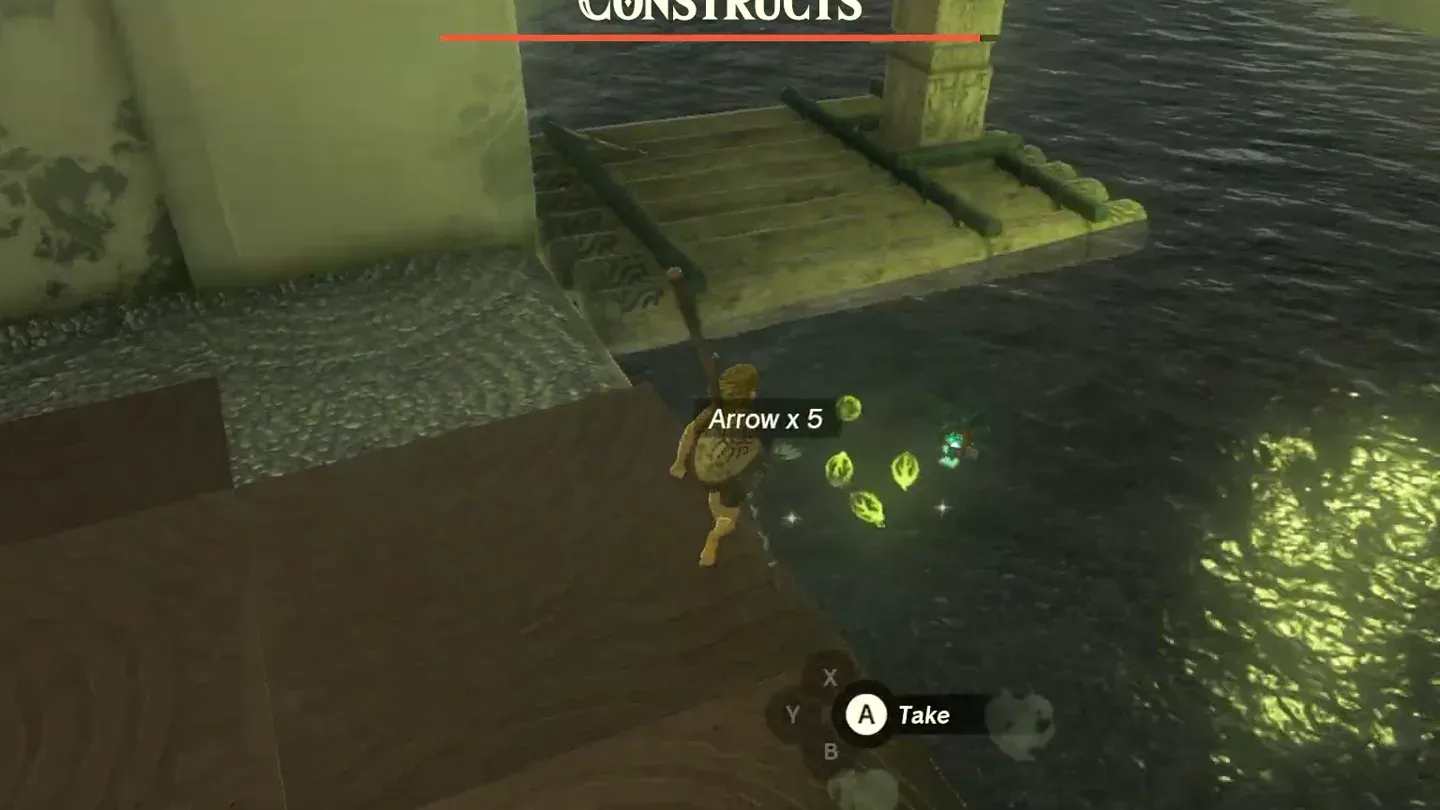 Link picking up arrows by the entrance