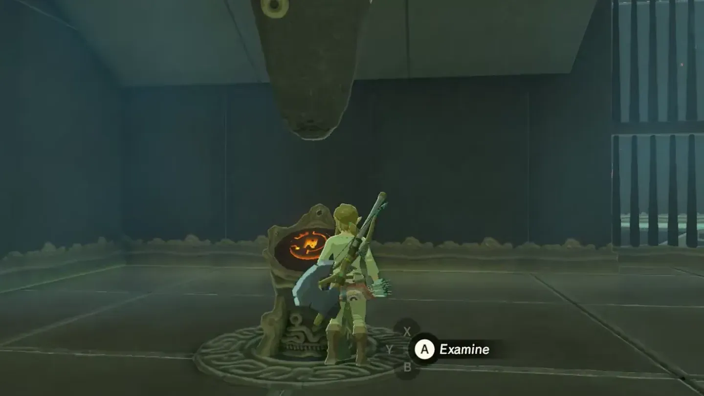 Link at the orange-lit terminal pedestal in the entrance room