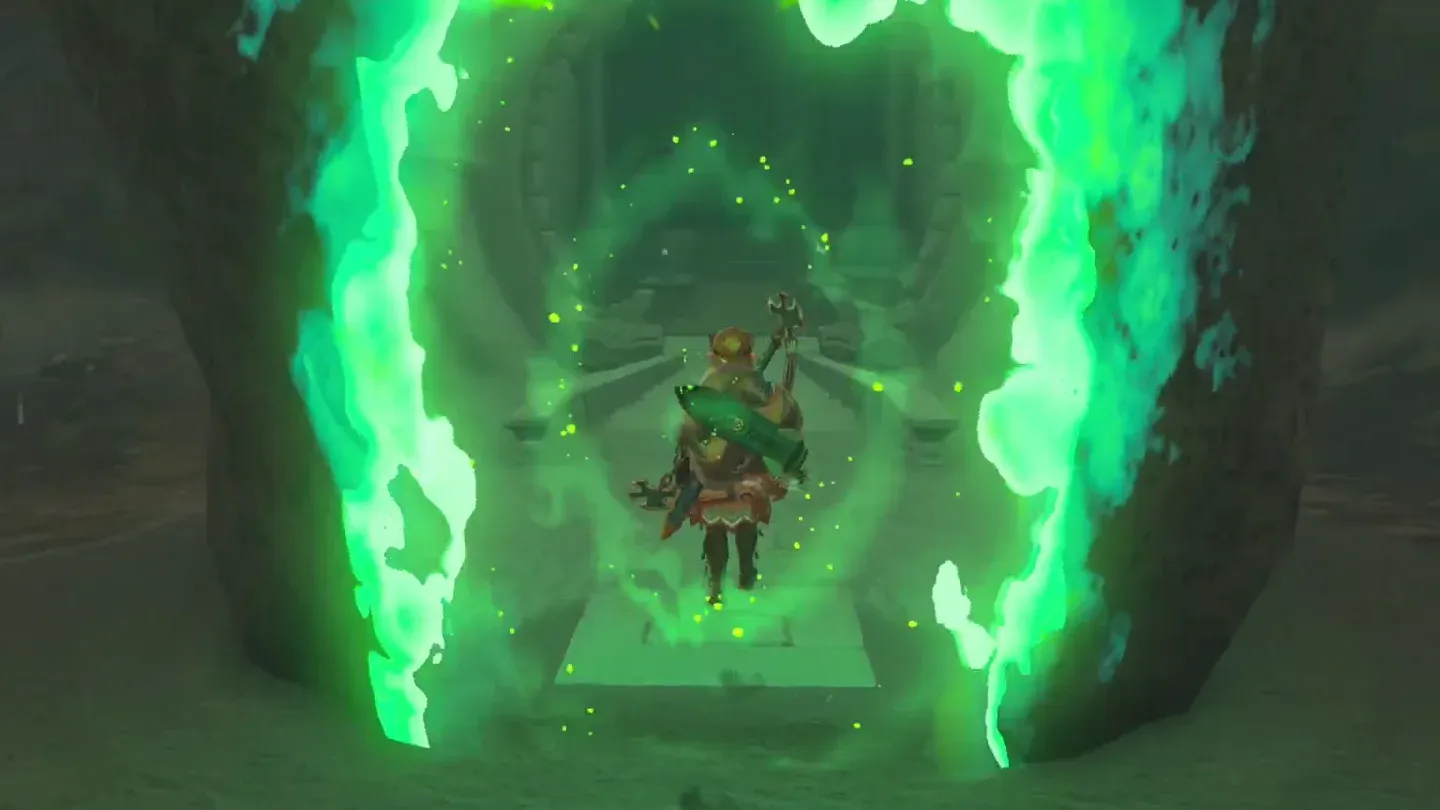 Link walking through the green-flamed doorway of Bamitok Shrine