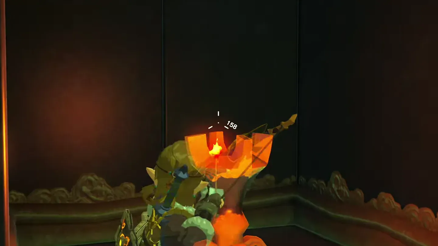 Link bringing a flame weapon to the unlit sconce beside the gate