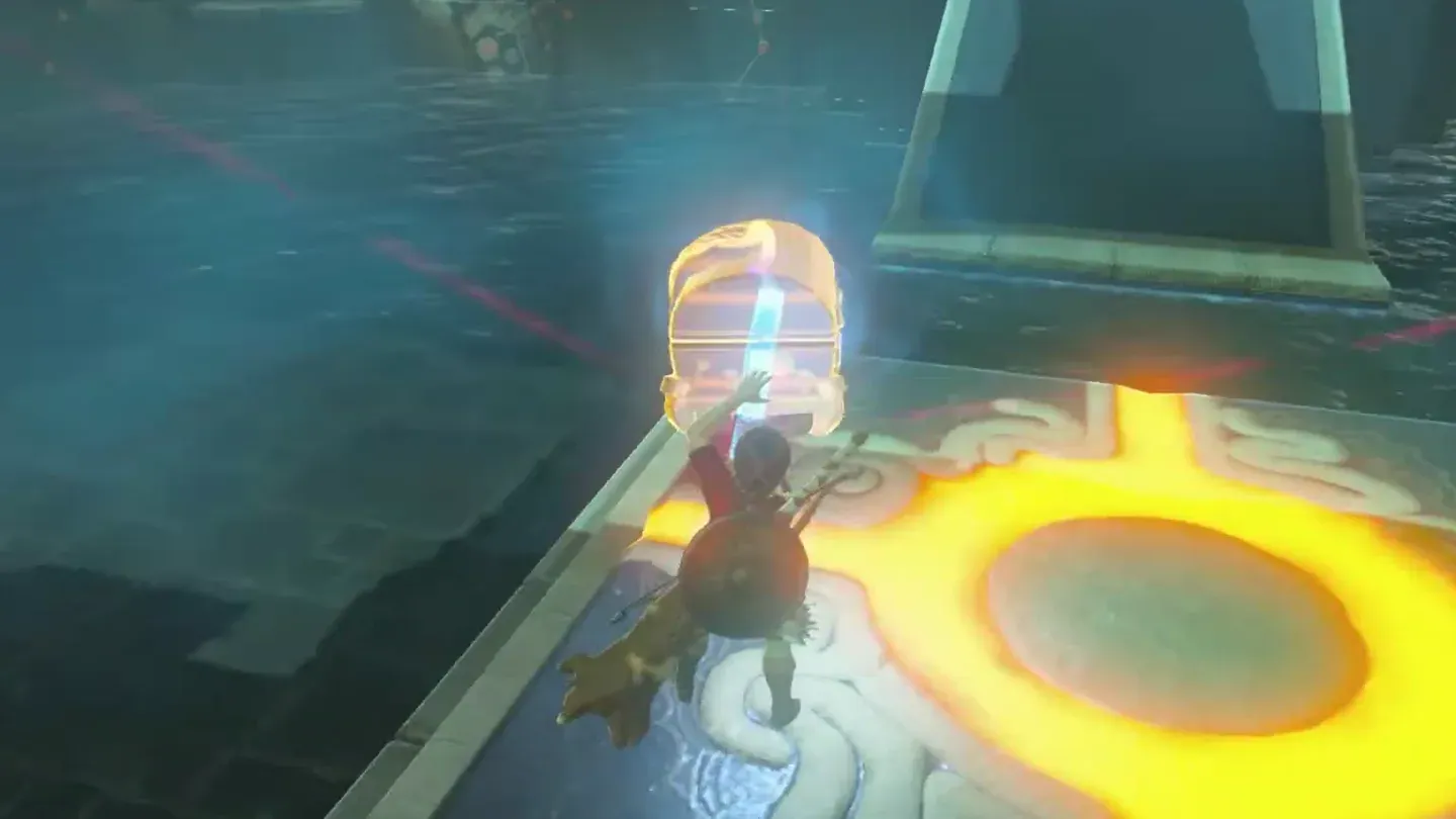 A treasure chest lifted out of the water with Magnesis beside the large switch