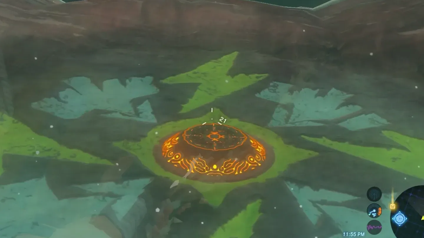 The orange pedestal at the center of the lightning-bolt mural