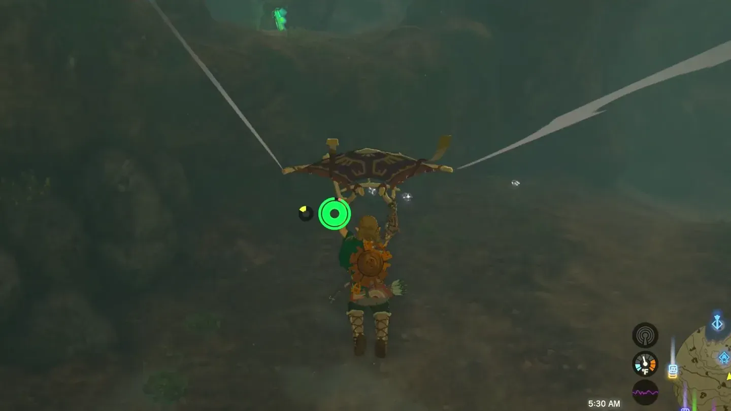 Link gliding down into the cave