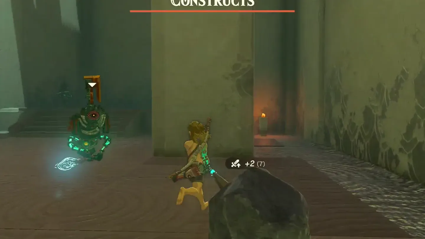 A Construct on a raised platform ahead, marked by an arrow