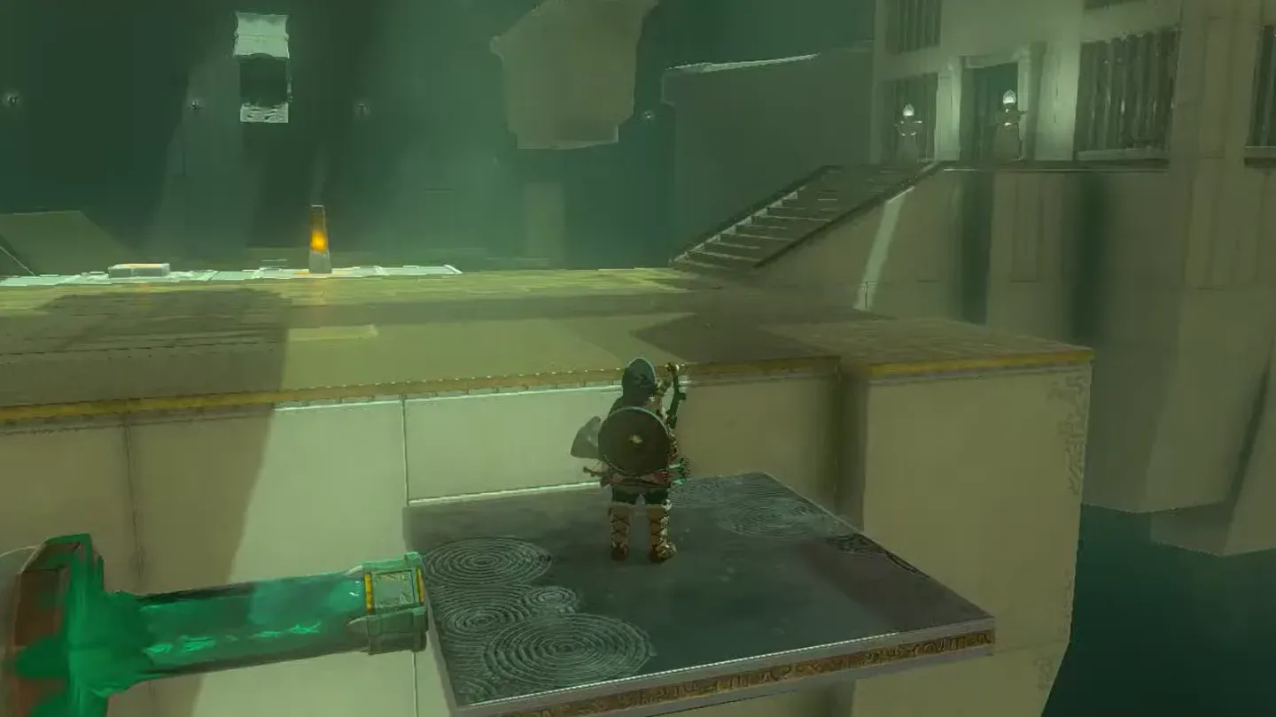 Link riding the moving platform across the gap