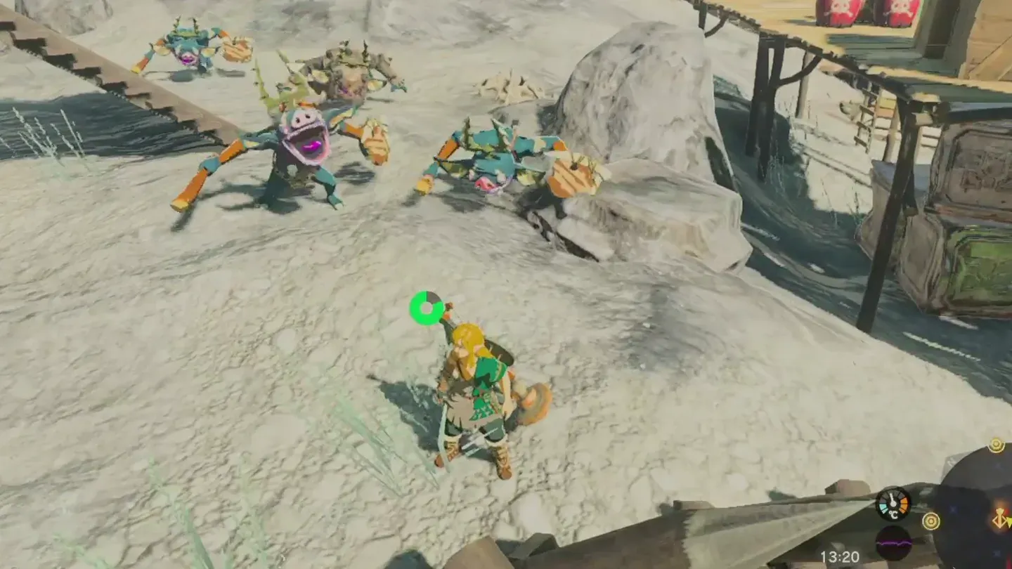 Bokoblins in a sandy camp running at Link, one of them blue