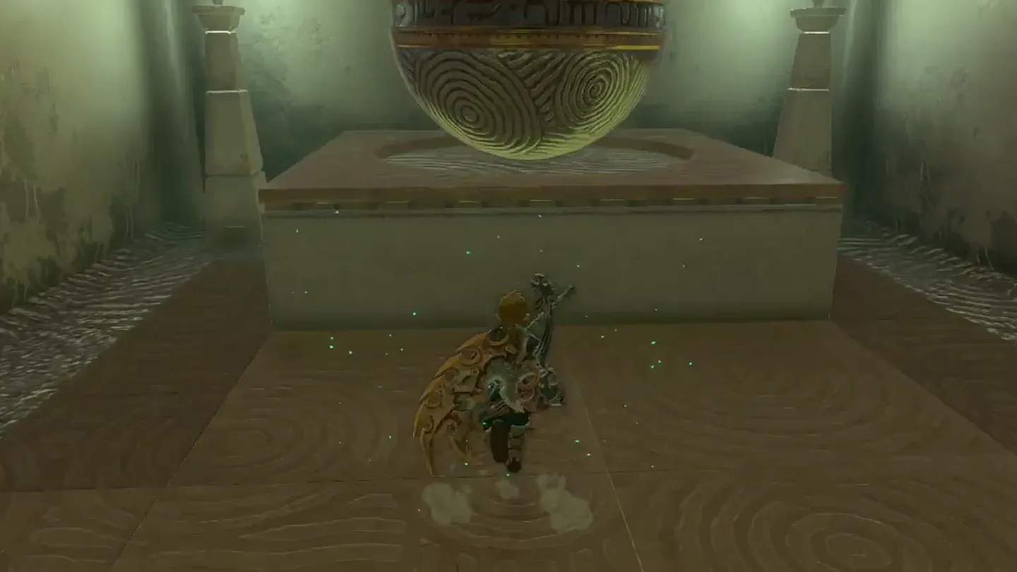 The big orb sitting on the platform in the corner