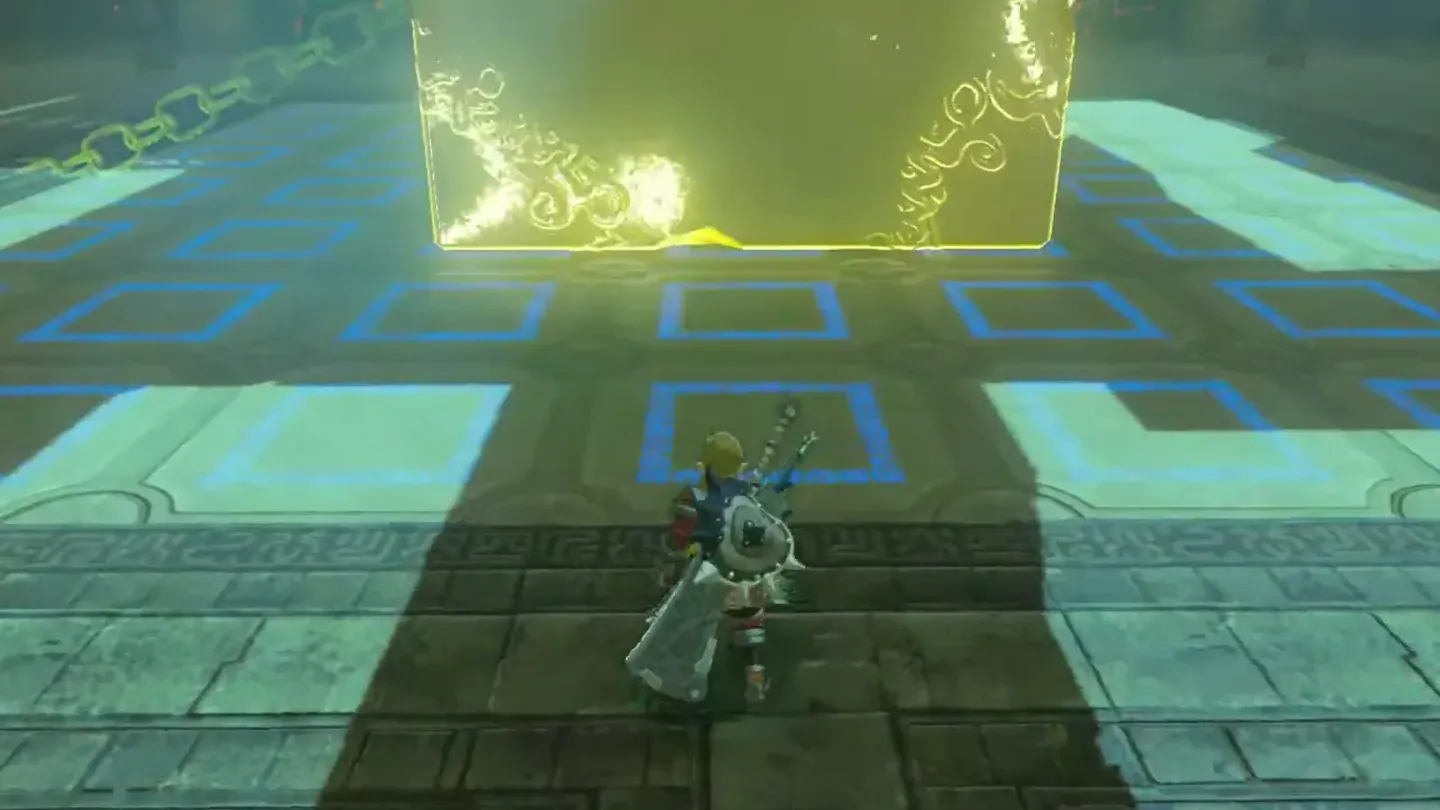 The stone block glowing yellow as it is pushed upward