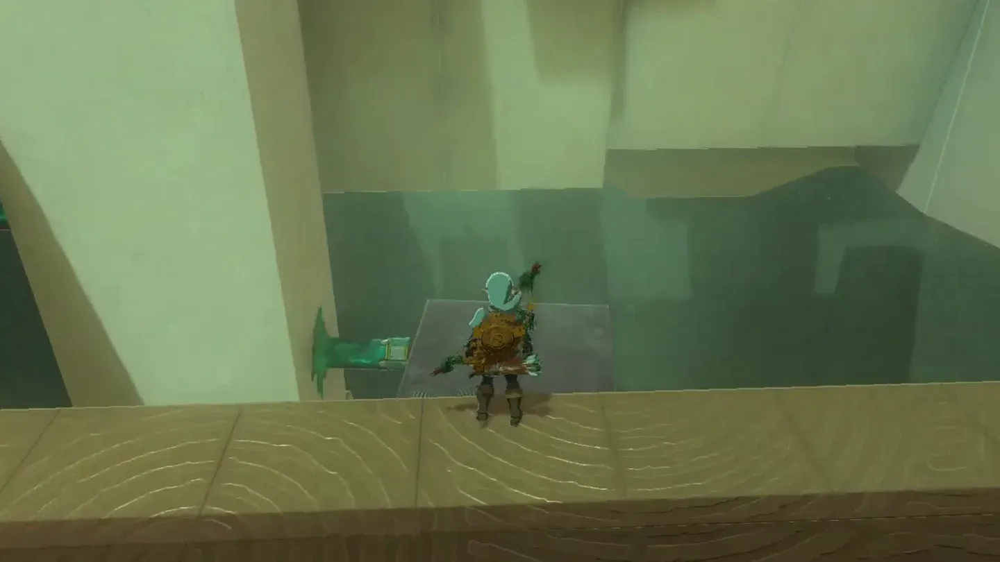 Link standing on the panel fixed to the monolith as it rises