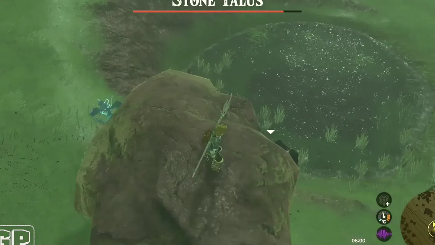 Link standing on top of a Stone Talus next to its ore