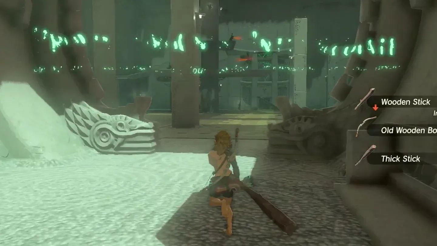Link at the trial start picking up a stick and an old bow