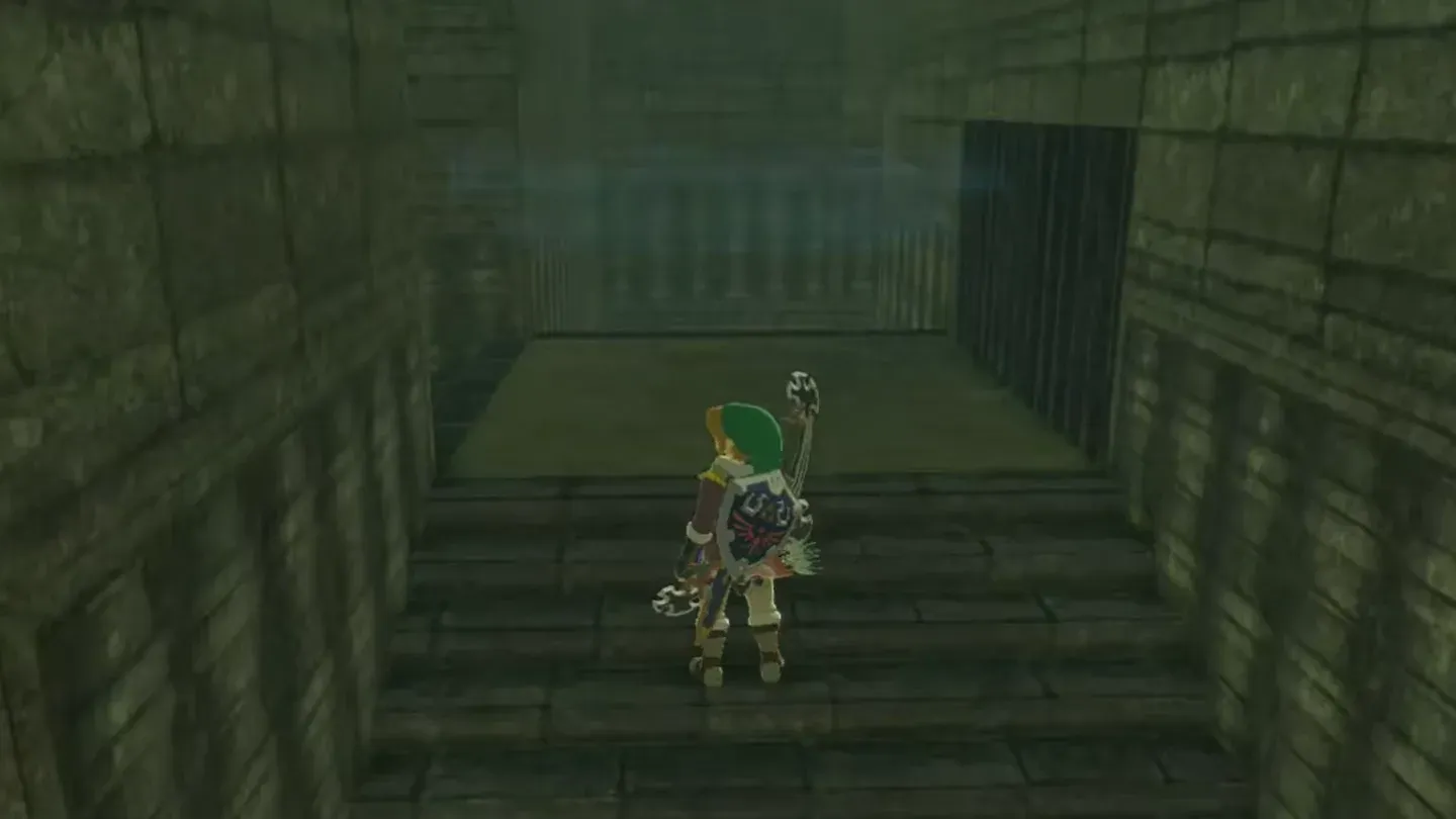 Link walking down a walled corridor inside the maze