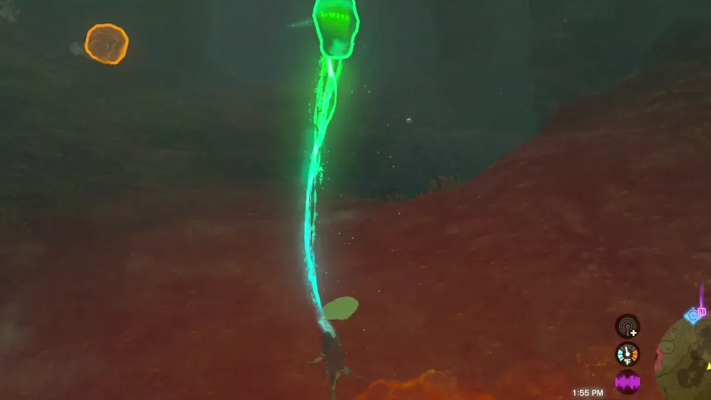 A boulder rolling down the red slope while Link carries the crystal