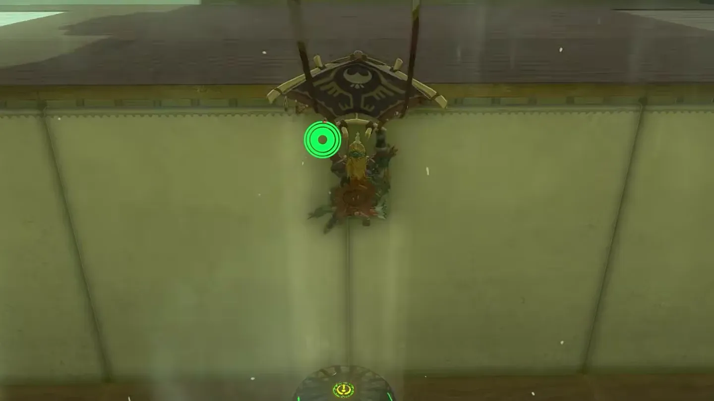 Link gliding up the fan's updraft beside a wall