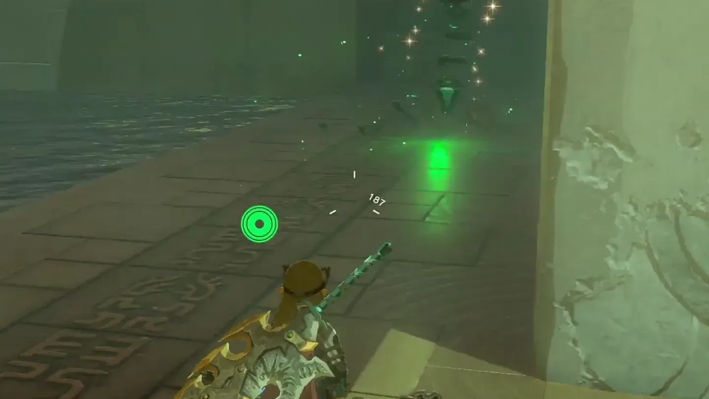 Link watching the target under the platform light up after the ball hit it