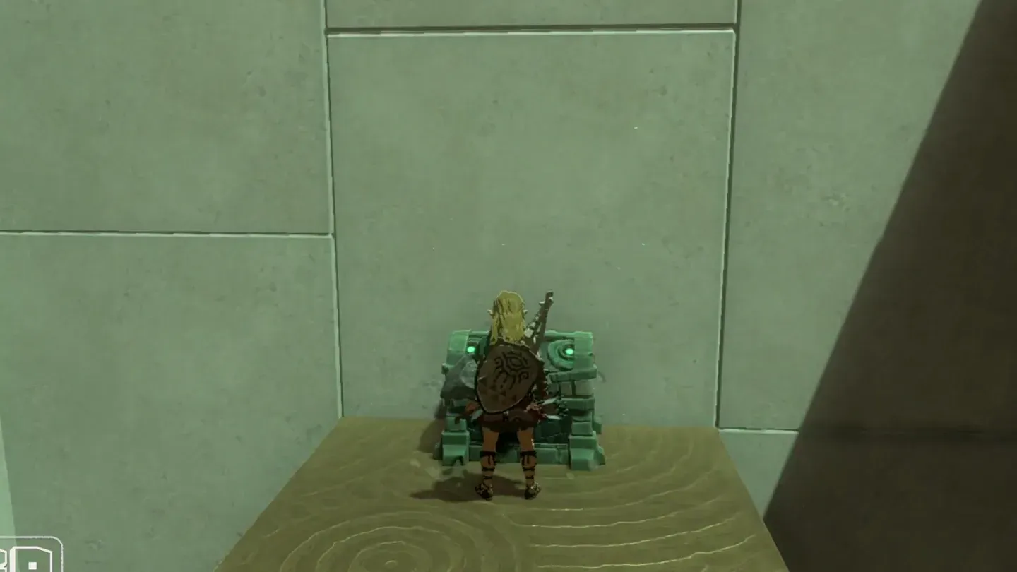 Link opening a chest on top of the smaller block