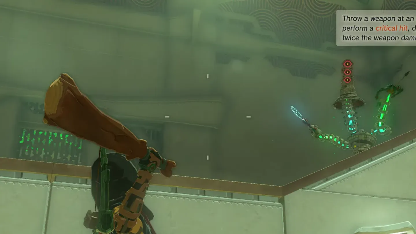 Link aiming a wooden club at the Construct moving along the wall
