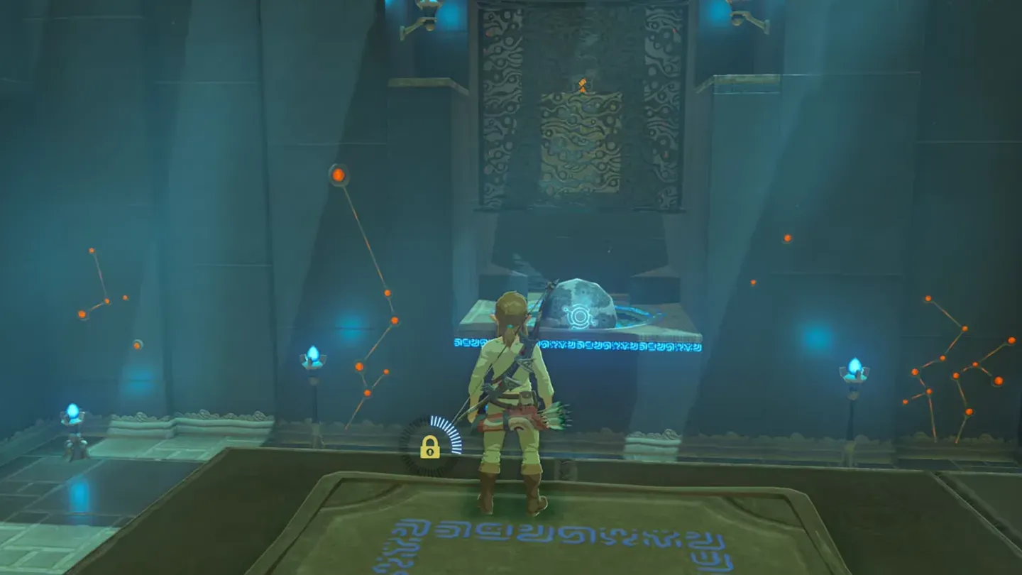 The orb resting in its socket and glowing blue