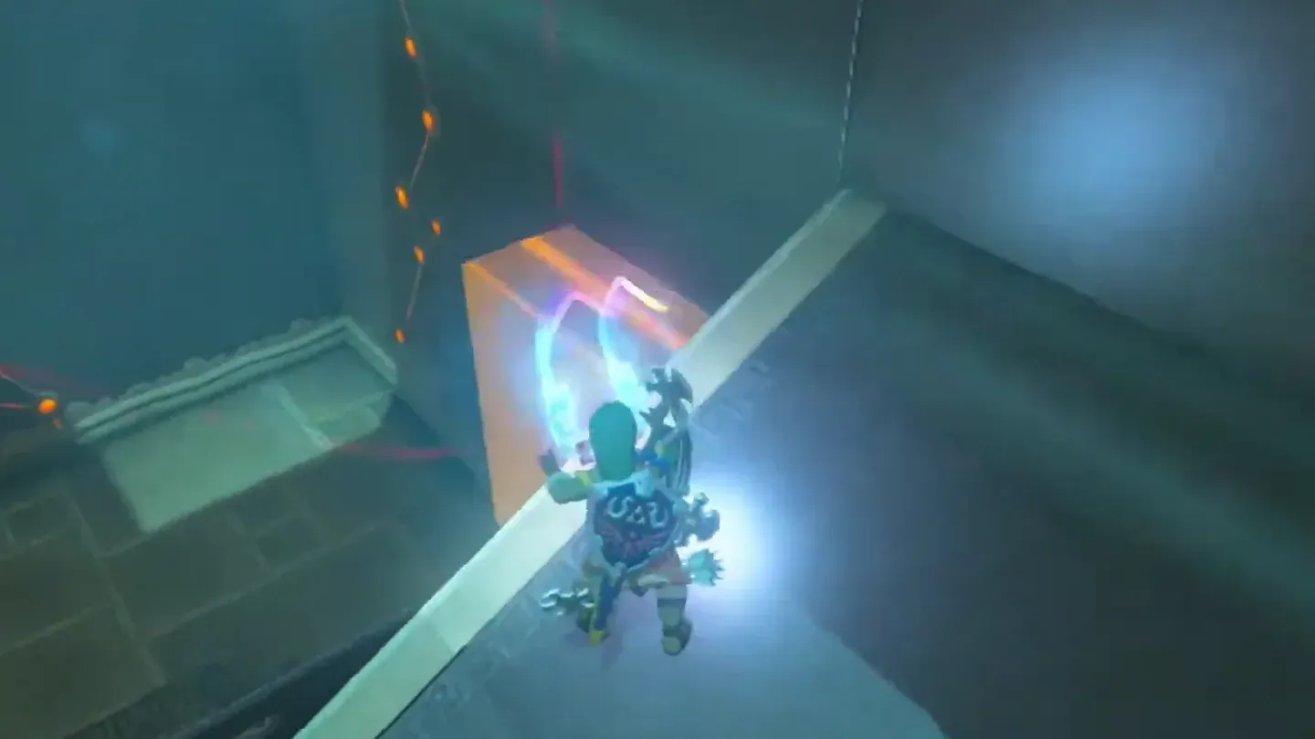 Link pulling the hidden block out of the wall with Magnesis