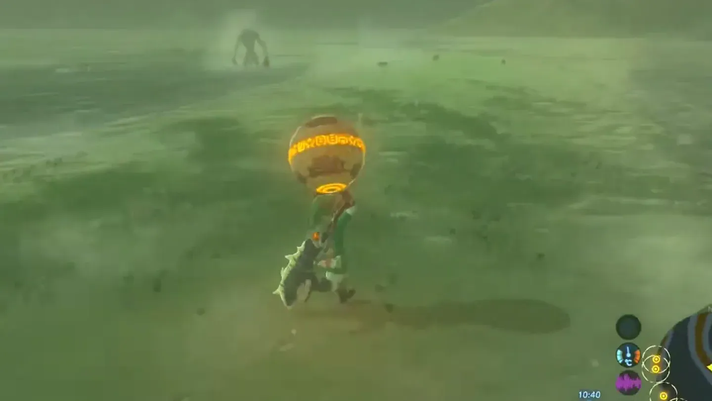 Link carrying the Ancient Orb over his head across windswept grass