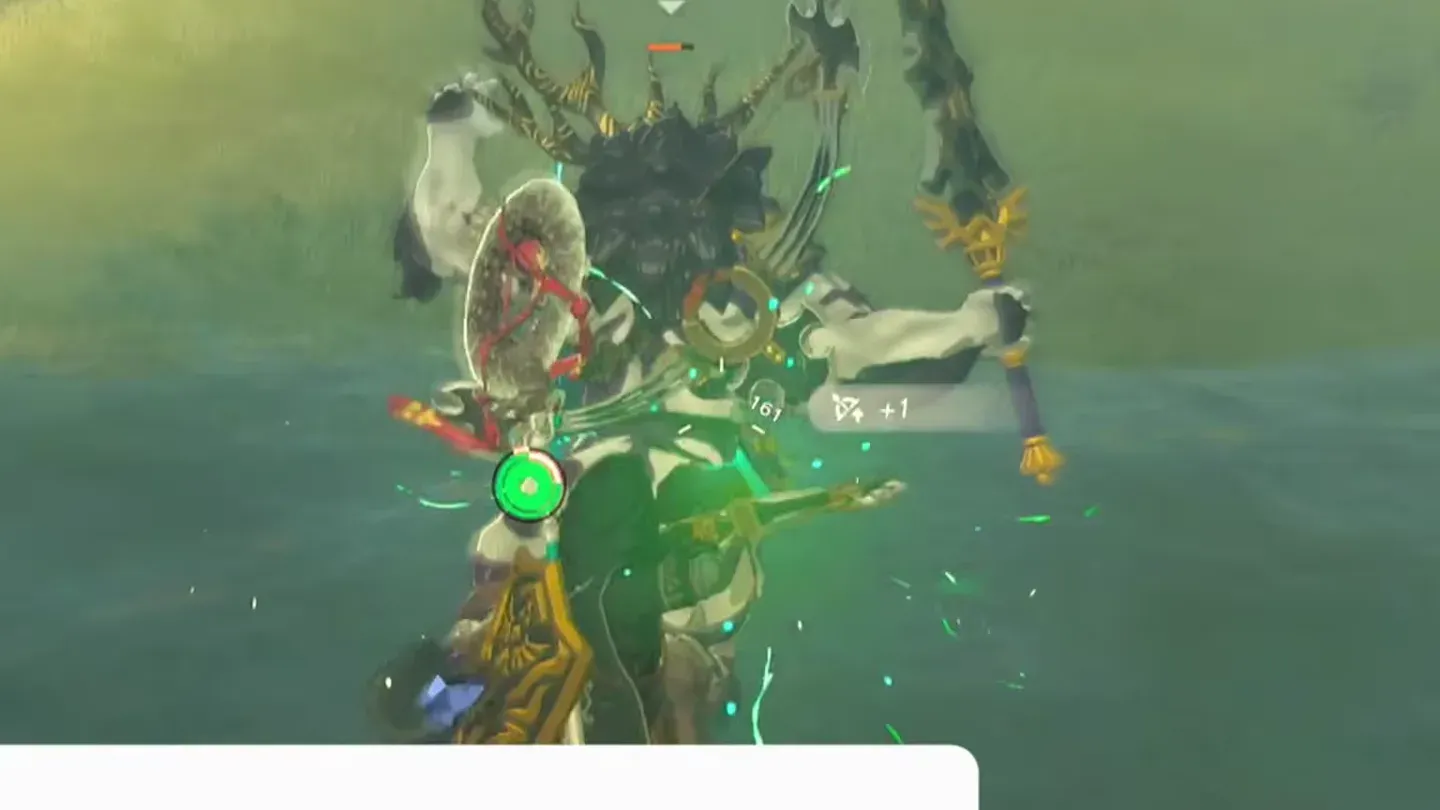 Link on the Lynel's back attacking it
