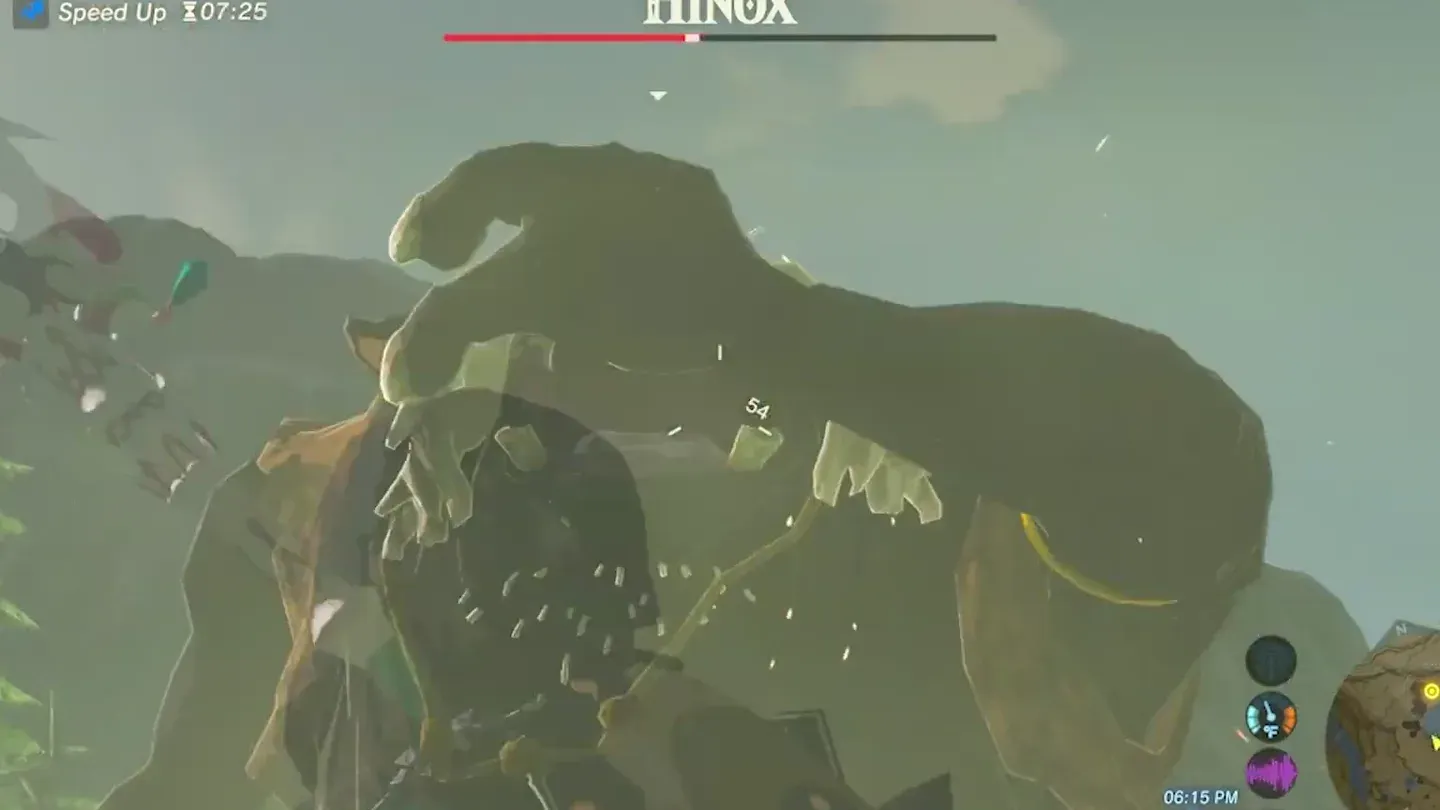 The Hinox holding a hand in front of its face