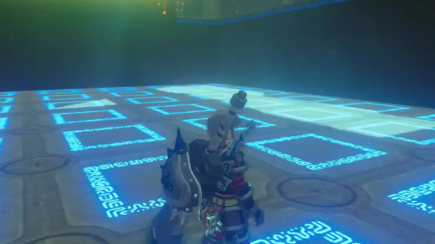 Link standing on the glowing bottom platform in the hole beneath the block