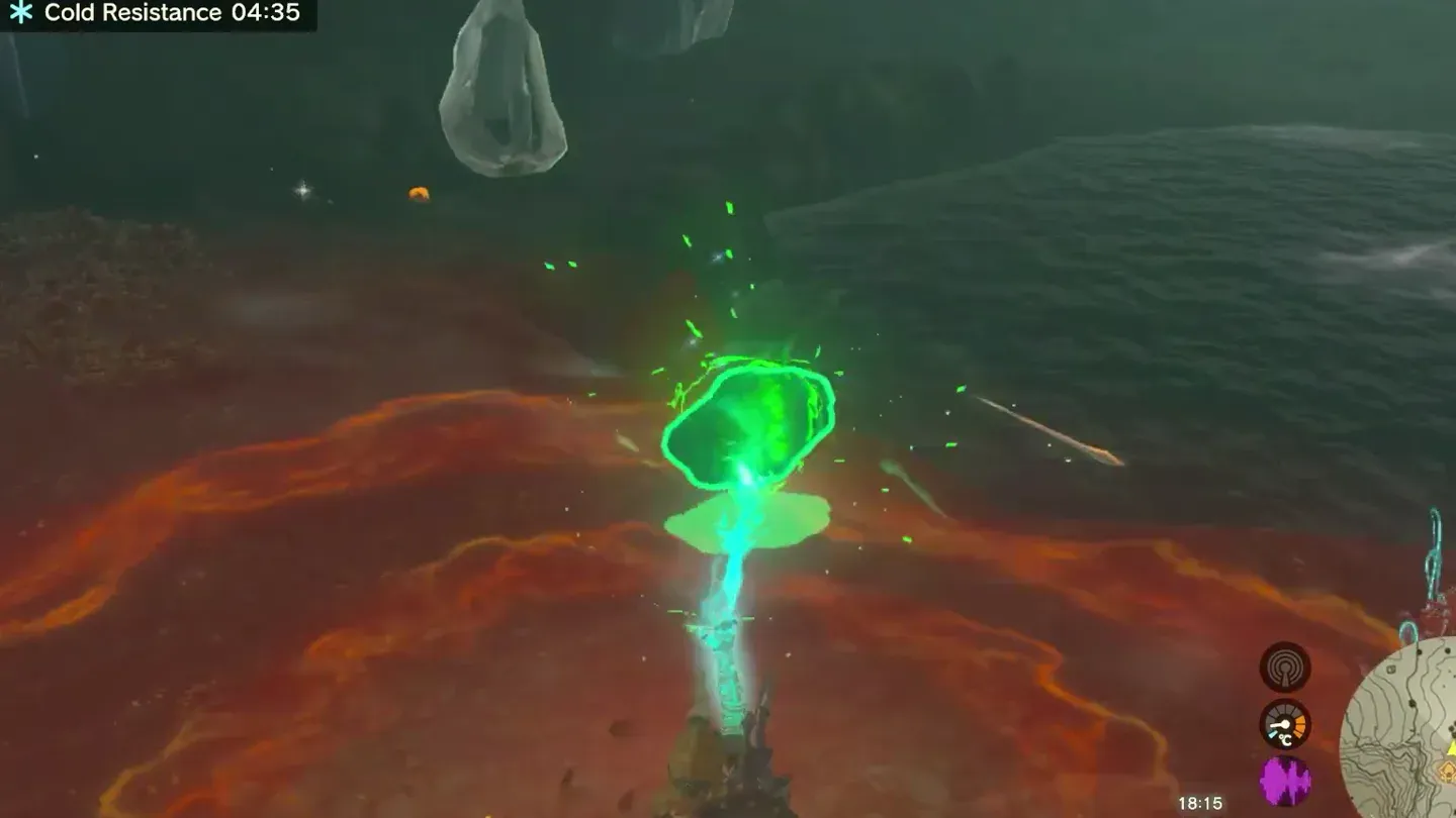 Link lifting the green crystal out of the lake with Ultrahand