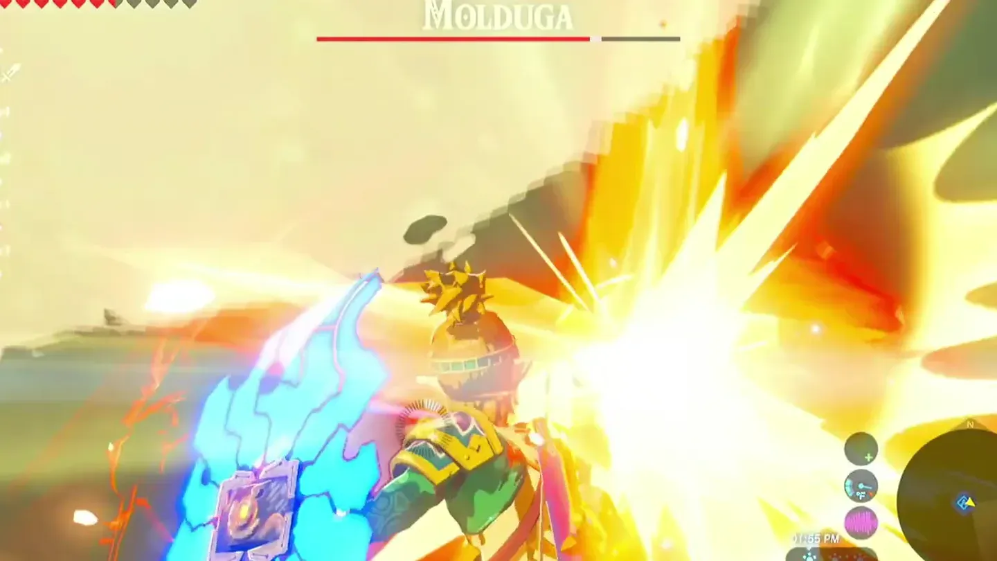 An explosion as the Molduga leaps out of the sand