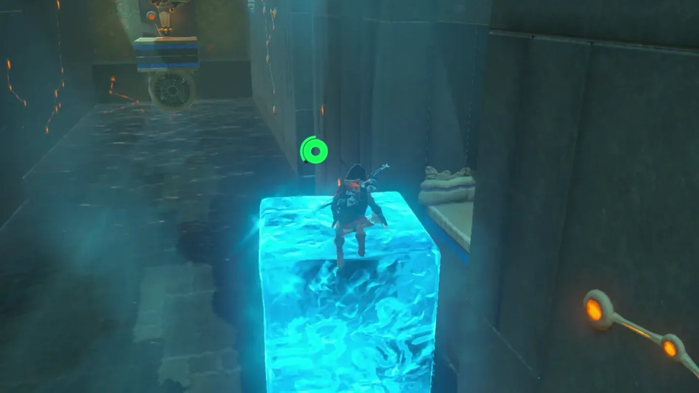 Link standing on an ice pillar in the flooded hallway
