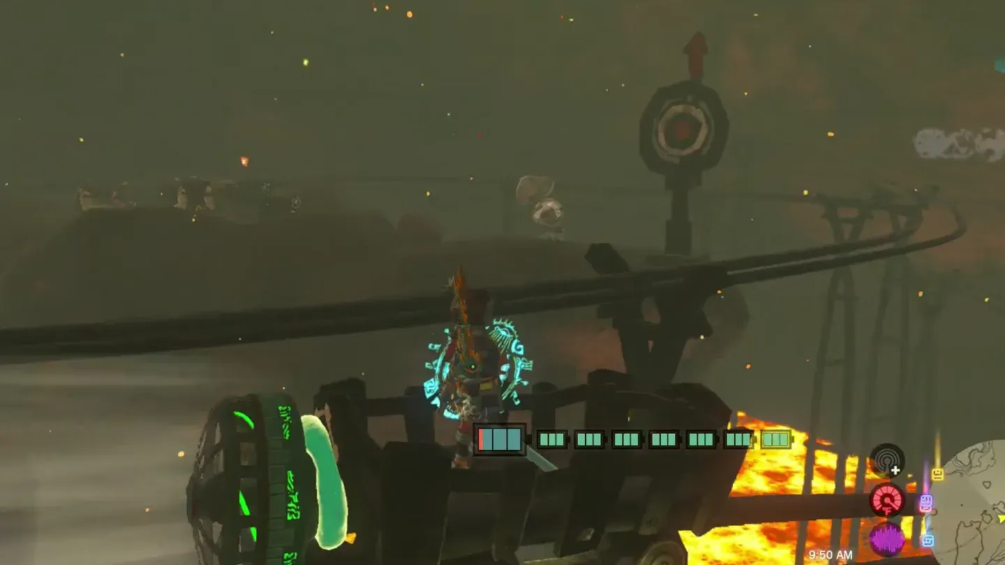 Link riding the fan cart toward a round target sign above the rails