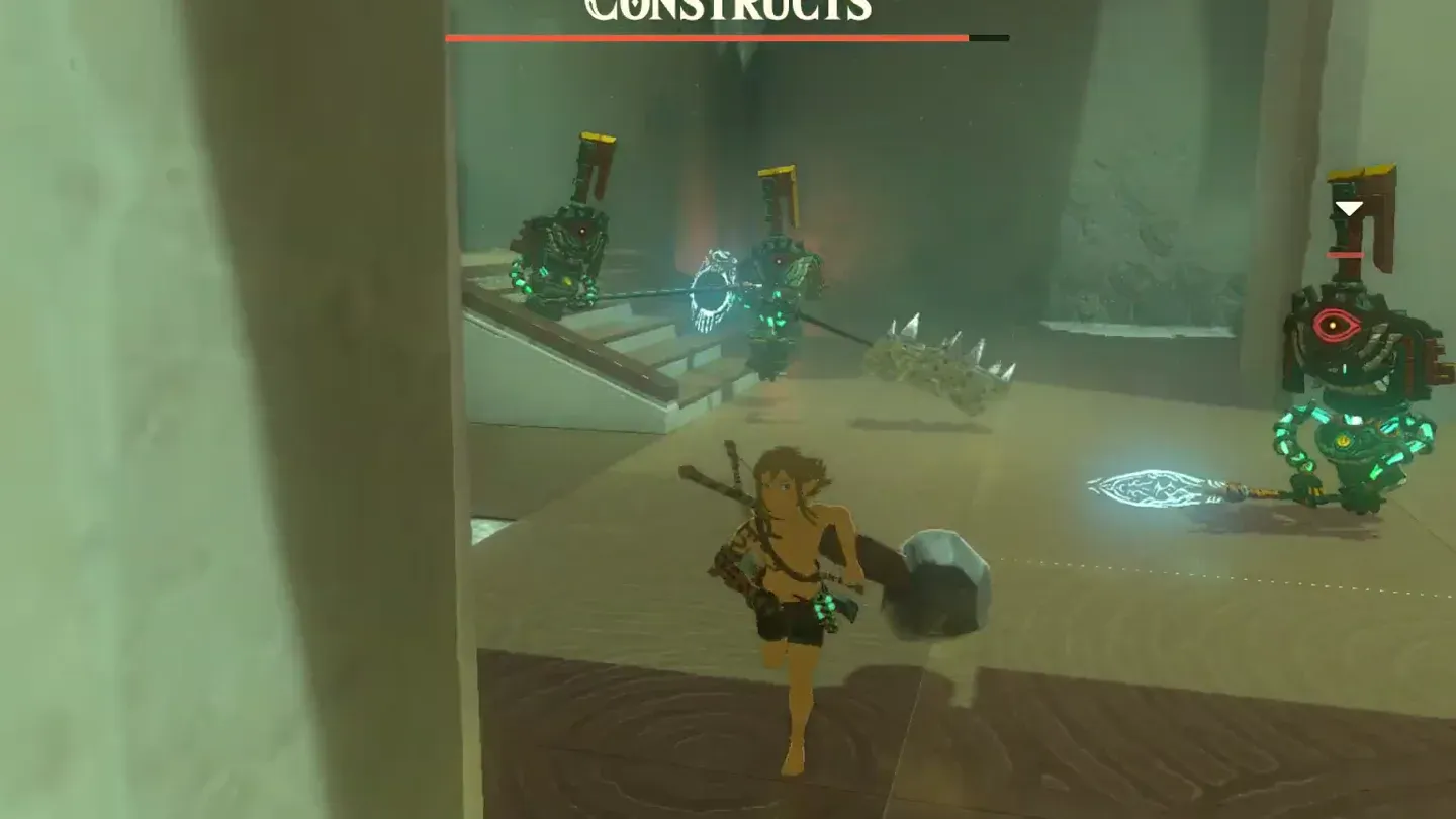 Link with a hammer facing a spear Construct closing in