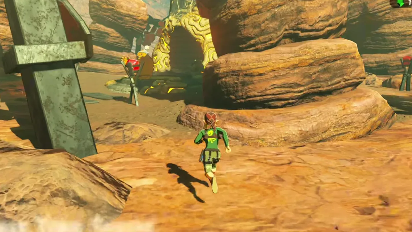 Link reaching the top of Gut Check Rock