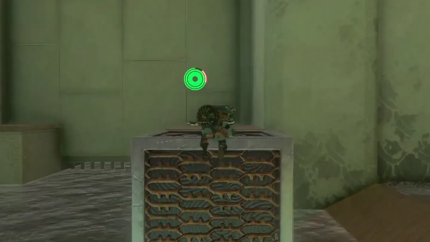 Link crouching on top of the box as it rises