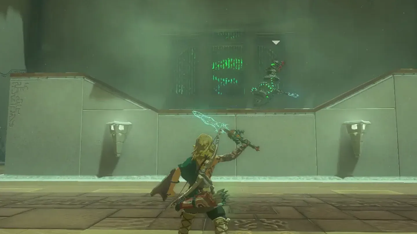 Link swinging a weapon at the Construct on the raised block with no effect
