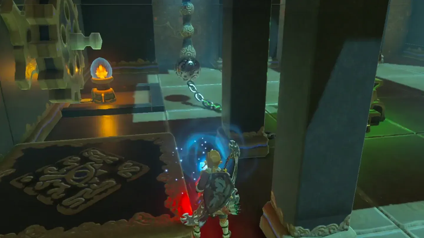 The ball resting by the bulb beside the moving platform