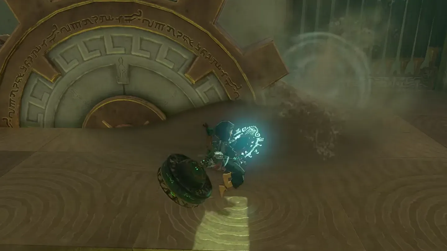 Link blowing sand away from the big gear with the Fan Guster