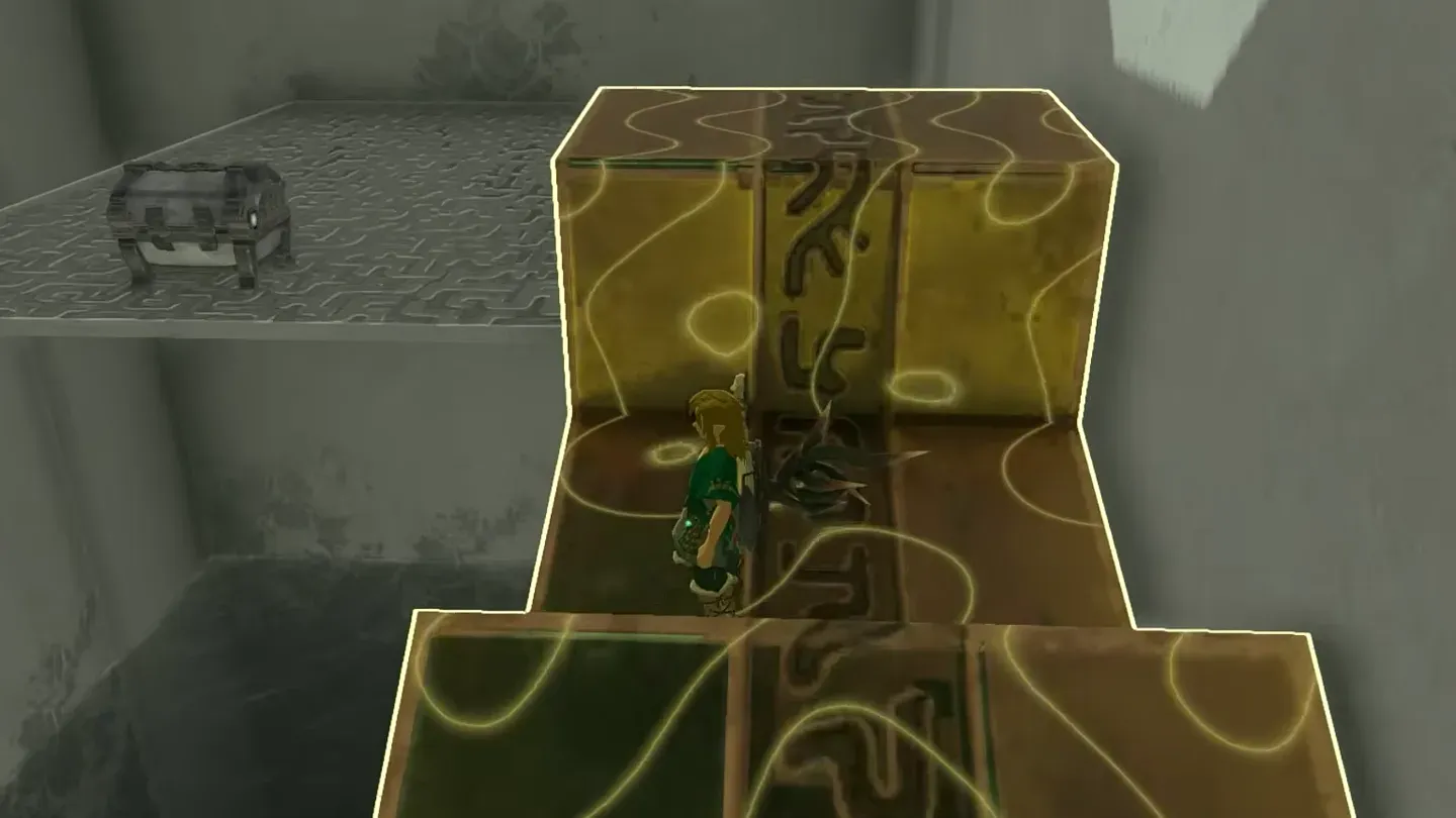 The gear carrying Link up beside the ledge with the chest