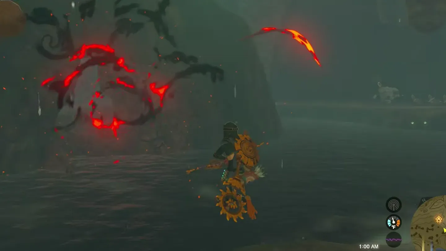 Rock debris flying from the blasted cave wall
