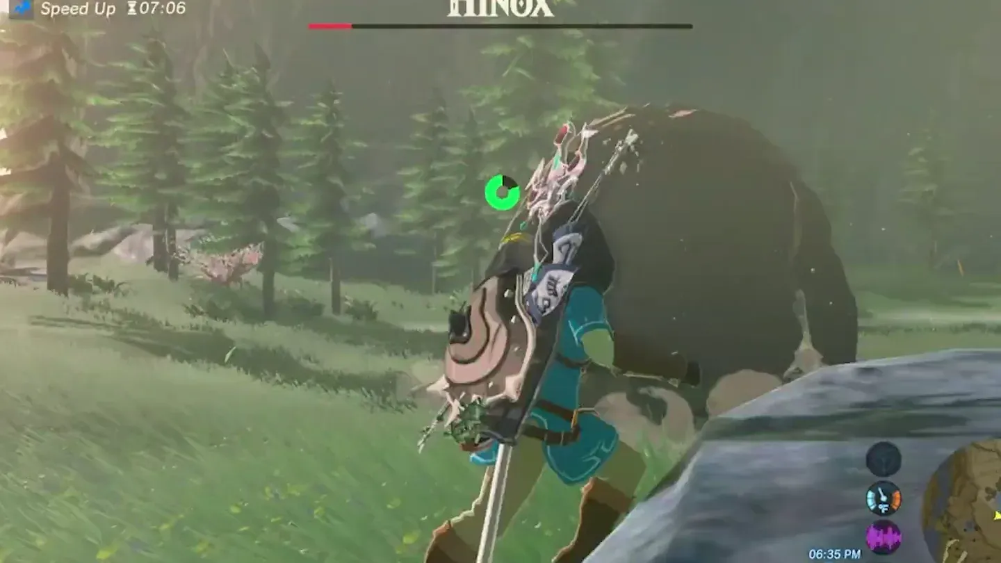 The Hinox doubled over while Link attacks